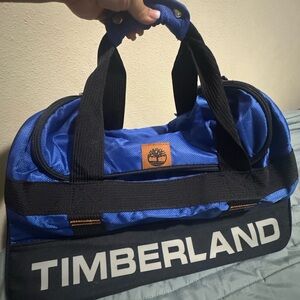 Timberland Blue and Black Duffel Bag